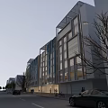 Modern Commercial Street Architectural Exterior With Glass Curtain Walls Evening Lights Pedestrians And Vehicles