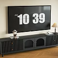 Black TV Stand With Large Screen TV Decorative Items And Table Lamp In Living Room