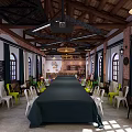 Spacious Conference Room With Long Table Colorful Chairs Arched Windows And Wooden Ceiling