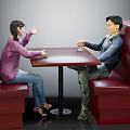 Two People Sitting in Red Booth Chatting Over Wooden Table With Glass Cup