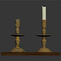 Decorative Golden Candle Holders With White Candle On Wooden Base