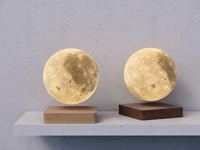 Two Moon Lamps With Light And Dark Wooden Bases On White Shelf Against Gray Wall 3d model
