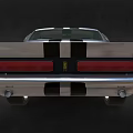 Vintage Silver Sports Car With Black White Stripes Front Grille And Yellow Emblem