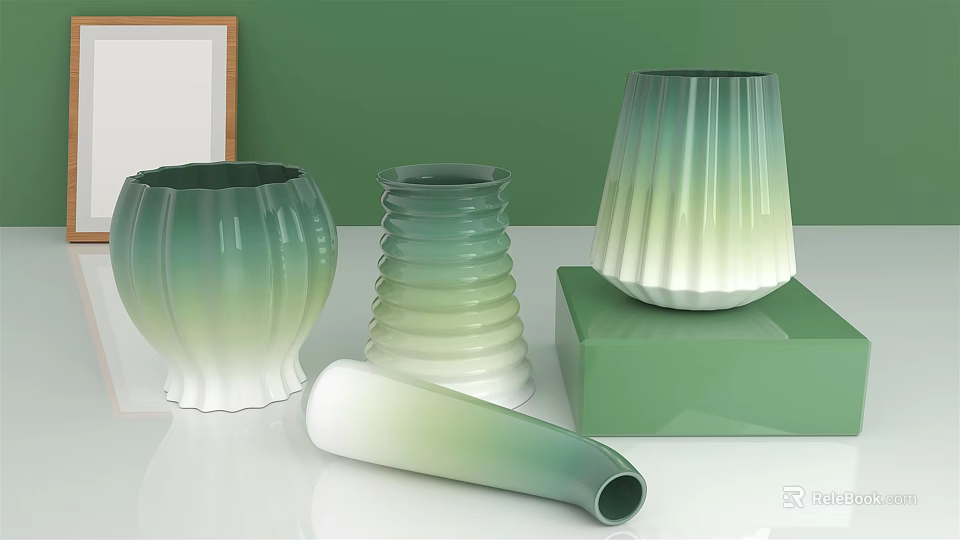 Decorative Ceramic Vases With Green To White Gradient And Unique Shapes On Green Cube 3d model 