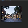 Vibrant Commercial Street with Pedestrians Trees Cafes Buildings and Evening Lighting