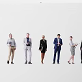 Group of Professional People in Business Attire Standing With Documents and Digital Devices