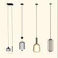 Modern Pendant Lights with Various Designs Hanging in Minimalist Interior Space
