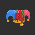 Colorful Jester Hat With Blue Red Green Sections And Golden Pom Poms On Dark Background