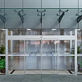 Modern Commercial Entrance With Glass Doors Facade Metal Brackets And Potted Plants