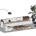 Cozy Beige Sofa and Coffee Table Set with Cushions Floor Lamp and Green Plant