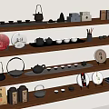 Traditional Tea Accessories Arranged on Wooden Shelves with Teapots Cups and Plates