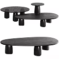Black Wooden Dining Tables With Unique Cylindrical Legs And Oval Tops Design