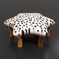 Star Shaped Stool With Black White Spots Pink Accents And Wooden Legs