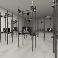 Art Installation With Metal Stands And Monitors Displaying Black And White Images In White Room