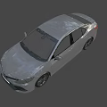 Toyota Sedan with Modern Sleek Design in Gray Featuring UK License Plate and Stylish Headlights
