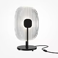 Modern Minimalist Table Lamp With Ribbed Transparent Shade And Black Base
