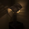Illuminated Modern Table Lamp With Black And White Striped Base And Transparent Striped Shade