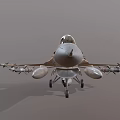 Military Fighter Jet With Camouflage Paint Mounted Missiles And Sharp Nose