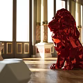 Elegant Banquet Hall Interior With Red Geometric Lion Sculpture Columns And Wooden Floor