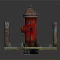 Vintage Red Fire Hydrant With Rusty Poles On Stone Paved Surface And Drain Grate