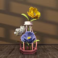 Floral Display with Pink Hexagonal Vase Yellow White Blue Flowers Green Leaves on Wooden Floor Shadow Effects