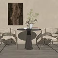 Modern Round Table With Woven Chairs Dark Wooden Painting And Vase Plant On Floor