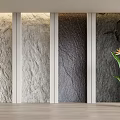 Textured Stone Background Wall With Light And Dark Panels And Potted Plant