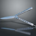 Balisong Knife With Silver Metal Body Hollowed Out Design Sharp Blade And Shiny Surface Reflection