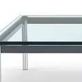 Modern Coffee Table With Clear Glass Top And Sleek Metal Frame Design