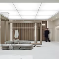 Modern Minimalist Clothing Store Interior With Clothing Racks Sofa And Mirror