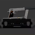 Pistol With Spare Parts Placed On Black Hard Case For Storage