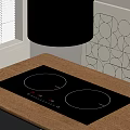 Sleek Modern Kitchen Induction Cooktop On Wooden Counter With Geometric Wall Art