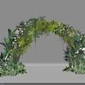 Lush Green Event Entrance Arch Decorated With Tropical Foliage And White Flowers