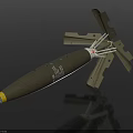 Military Bomb Weapon With Green Body Yellow Tip And Deployable Metal Tail Fins