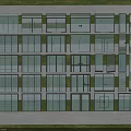 Aerial View Of Organized Glass Building Layout With Green Lawns And Gray Pathways