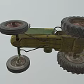 Vintage Green And Yellow Tractor With Large Wheels Steering Wheel And Exhaust Pipe