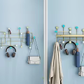 Modern Blue Wall Mounted Hook Organizer with Hanging Headphones Purse Towel and Colorful Beads