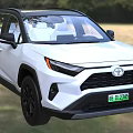 White Toyota SUV With Black Wheels And Front Design In Outdoor Grass Background
