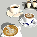 Coffee Cups with Latte Heart Art Black Coffee Kenco Brand and Spoons on Saucers