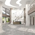 Front Desk Reception Area with Marble Wall Large Windows and Tall Columns Natural Light