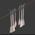 Wooden Spoons and Spatulas Utensil Set Hanging on Clothesline with Blue Background