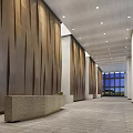 Office Hallway Featuring Brown Vertical Striped Walls White Ceiling Marble Reception Desk And Large Windows