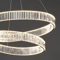 Modern Spiral Crystal Chandelier With Illuminated Rings In Dark Room Setting