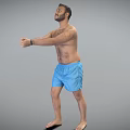 Shirtless Man in Blue Shorts Standing with Arms Stretched Forward Against Gray Background
