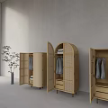 Wooden Wardrobes With Rattan Design Open Doors Displaying Clothes Inside Minimalist Interior Natural Light