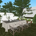 Garden Landscape Design With Outdoor Dining Table White Tablecloth Green Plants And String Lights