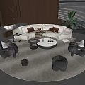 Modern Sectional Beige Sofa With Round Coffee Table And Gray Armchairs On Round Rug