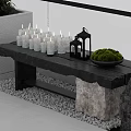 Outdoor Terrace Setup With Wooden Table White Candles Black Lantern And Green Moss