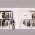 Original Design Hangers with Clothes and Potted Plant in FRAME Store