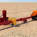 Industrial Equipment With Red Pump Yellow Connecting Components And Orange Trailer On Sandy Ground